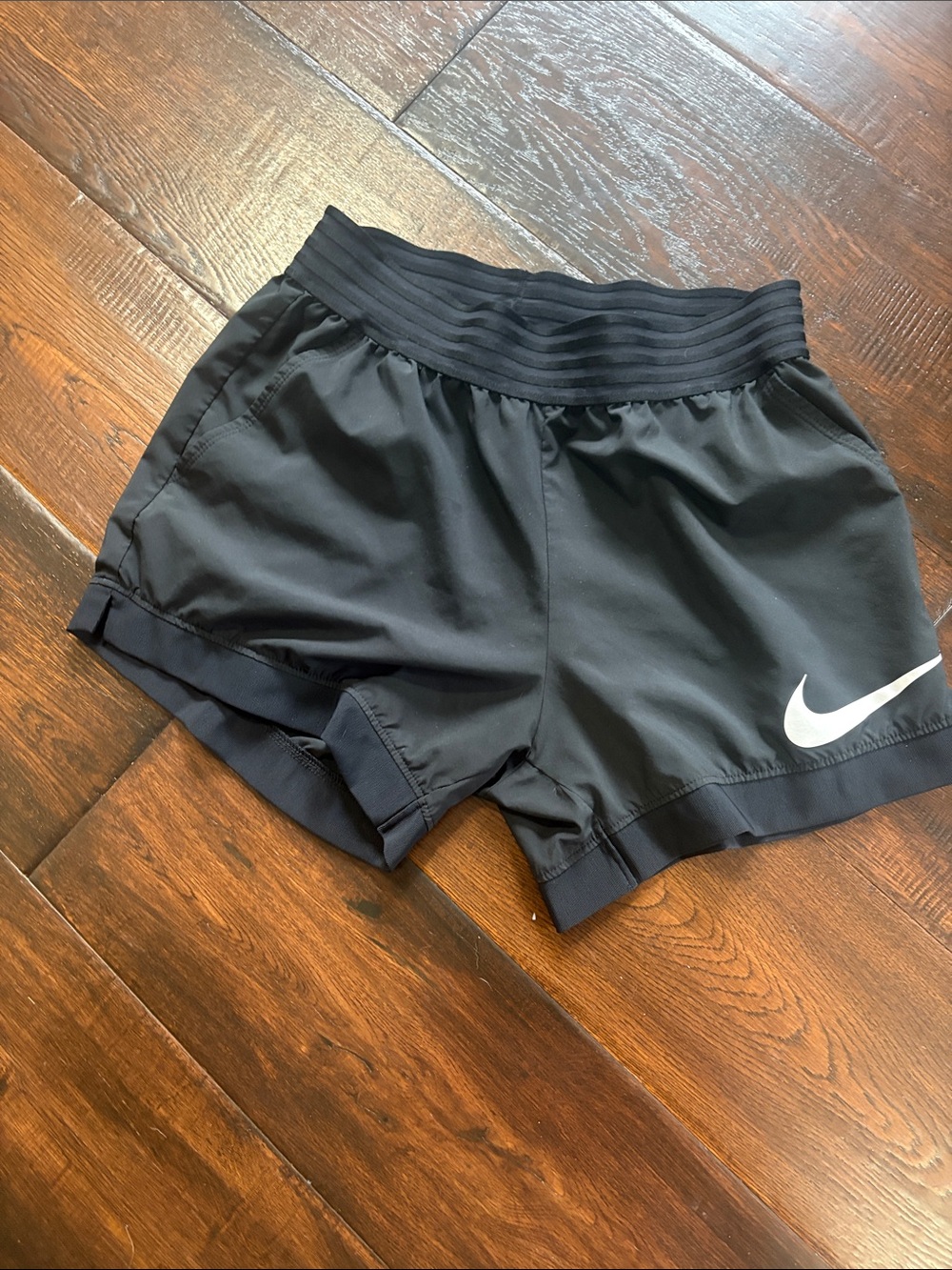Nike Women's Black Athletic Running Shorts with White Swoosh
